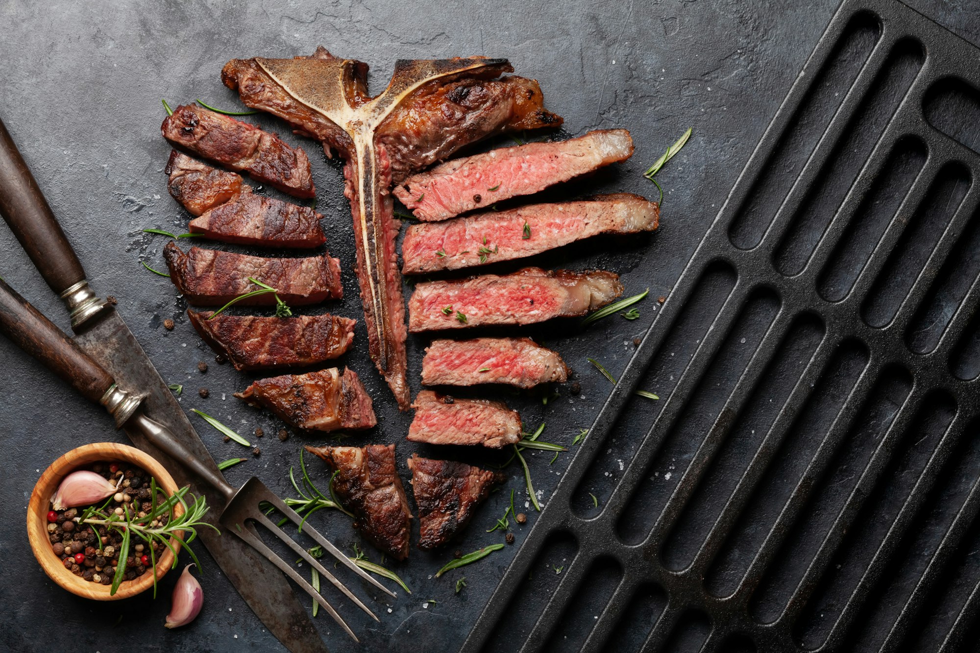 Grilled porterhouse beef steak. Sliced T-bone