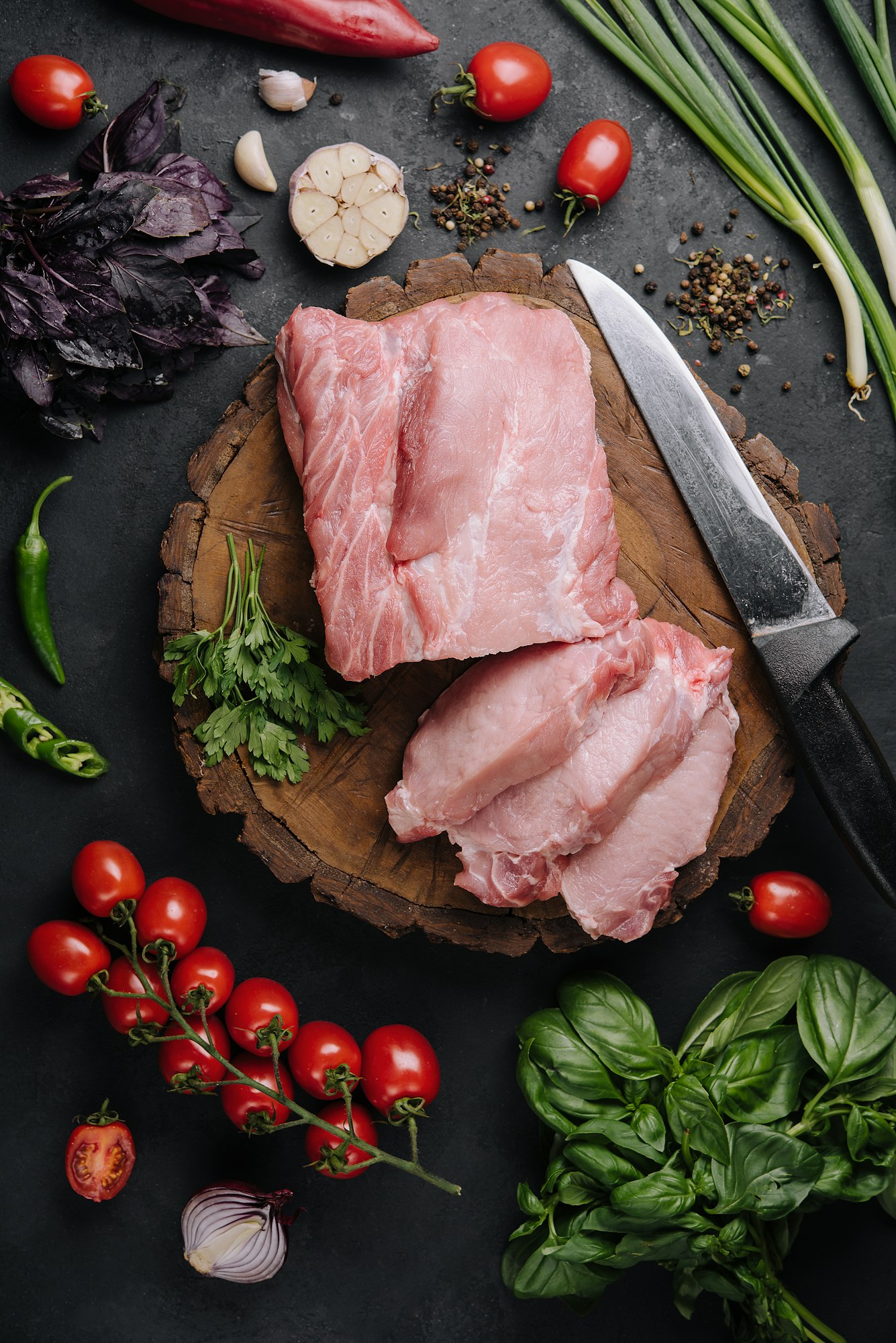 Raw pork neck meat cuts with spices